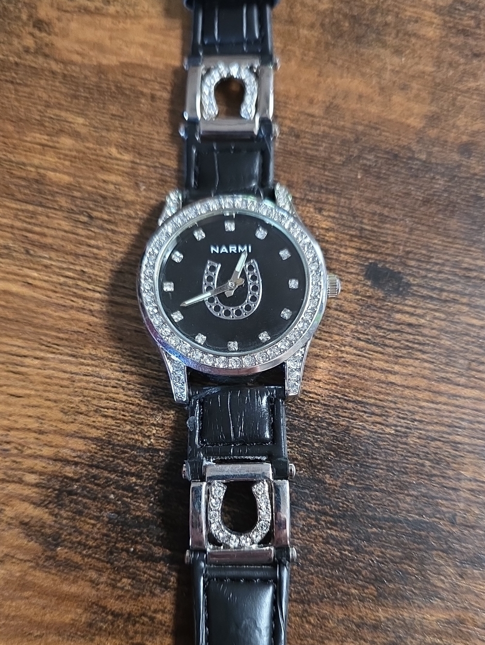 Narmi equestrian-themed rhinestone quartz fashion watch